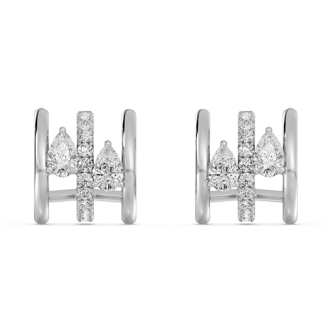 White Gold 18K Triple Hoop Huggie Earrings highlighted by lab-grown pear and round-cut diamonds, offering a sleek and modern aesthetic with a secure closure