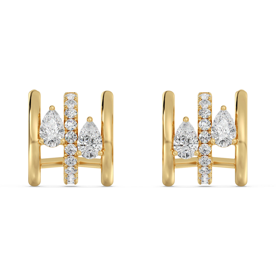 Yellow Gold 18K Triple Hoop Huggie Earrings adorned with lab-grown pear and round-cut diamonds, featuring a secure closure and a timeless, sophisticated design