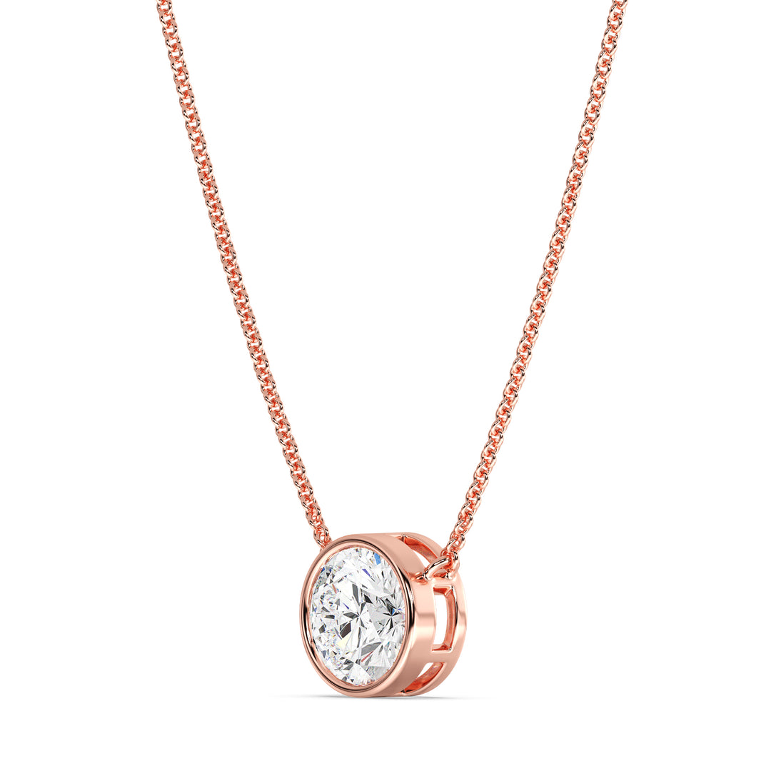 2 Carat Bezel-Set Round Lab-Grown Diamond Solitaire Pendant Necklace in 18K Rose Gold. IGI-certified diamond featuring a modern bezel setting, complemented by a warm rose gold chain