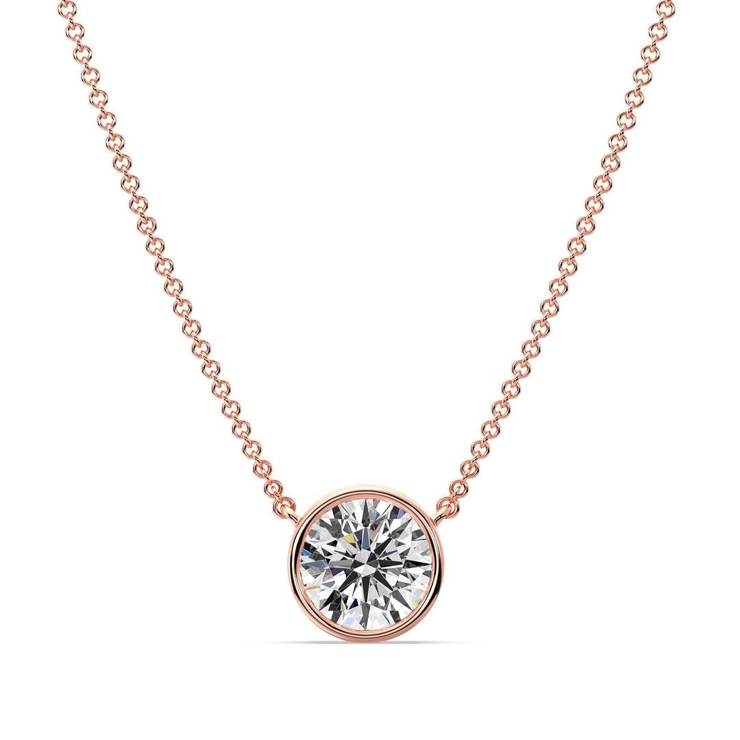 2 Carat Bezel-Set Round Lab-Grown Diamond Solitaire Pendant Necklace in 18K Rose Gold. IGI-certified diamond featuring a modern bezel setting, complemented by a warm rose gold chain