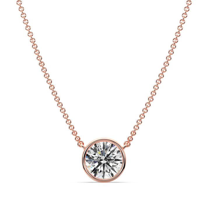 2 Carat Bezel-Set Round Lab-Grown Diamond Solitaire Pendant Necklace in 18K Rose Gold. IGI-certified diamond featuring a modern bezel setting, complemented by a warm rose gold chain