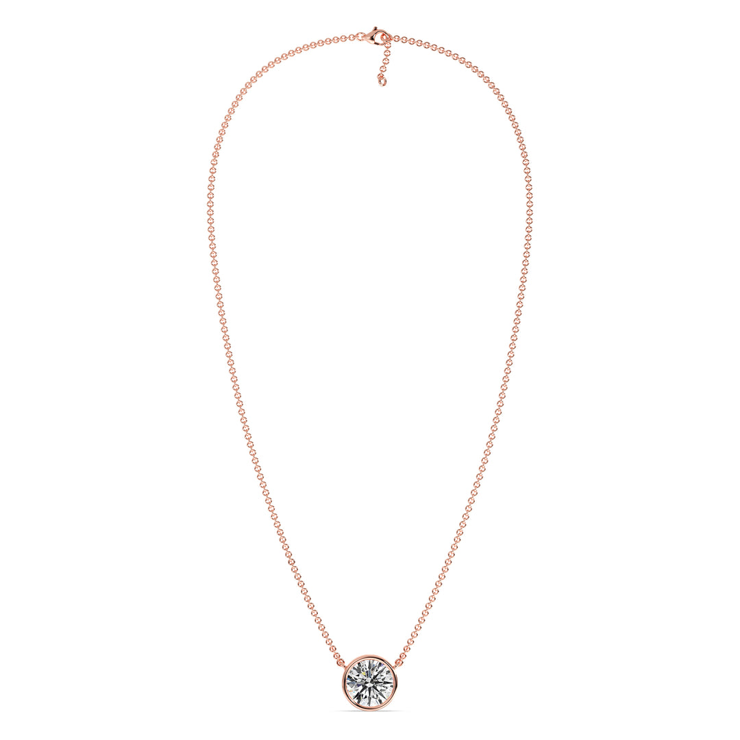 2 Carat Bezel-Set Round Lab-Grown Diamond Solitaire Pendant Necklace in 18K Rose Gold. IGI-certified diamond featuring a modern bezel setting, complemented by a warm rose gold chain