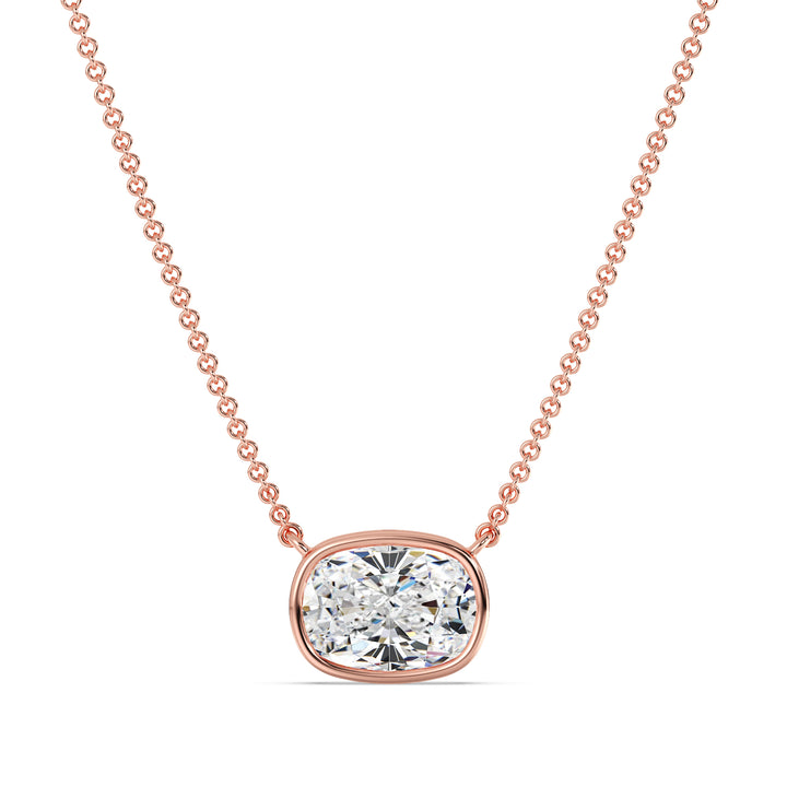 A beautiful 2 Carat Cushion-Cut Lab-Grown Diamond Bezel-Set Solitaire Pendant Necklace in 18K Rose Gold. The romantic pinkish tone enhances the sparkle of the IGI-certified diamond, making it a perfect blend of charm and sophistication.