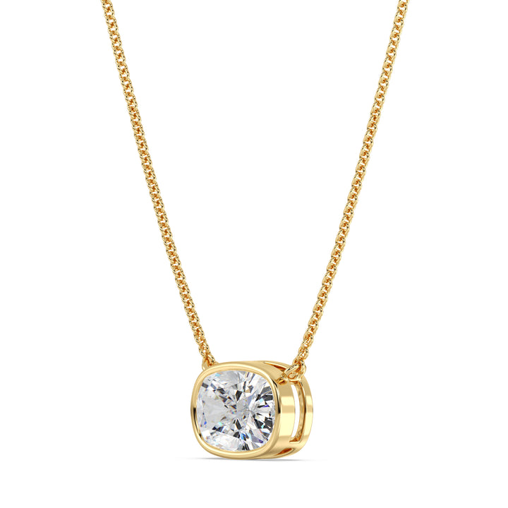 A stunning 2 Carat Cushion-Cut Lab-Grown Diamond Bezel-Set Solitaire Pendant Necklace in 18K Yellow Gold. The warm golden hue complements the brilliance of the IGI-certified diamond with E color grade and VS clarity, creating a timeless and elegant design.
