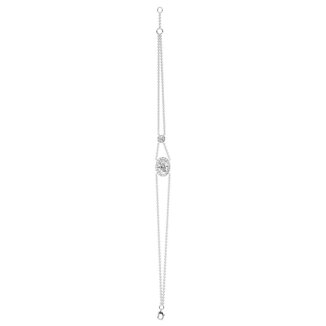 Double Chain 18K White Gold Bracelet with a 1ct Oval-Cut Lab-Grown Diamond in a halo setting, accented by 20 Round-Cut EF/VS Lab-Grown Diamonds for a sleek and timeless design.