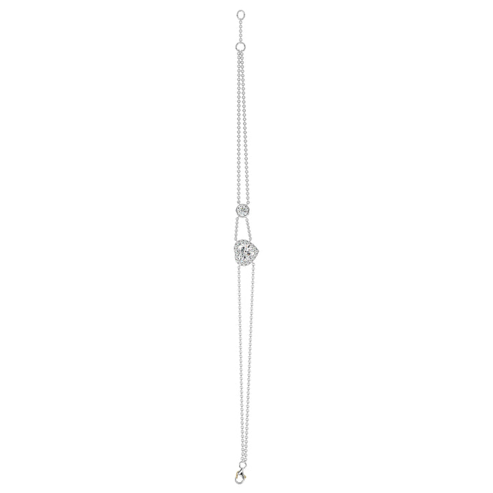 Double-chain bracelet in 18K white gold featuring a 1ct heart-cut lab-grown diamond in a shimmering halo of 19 round EF/VS lab-grown diamonds, offering a sleek and classic look.