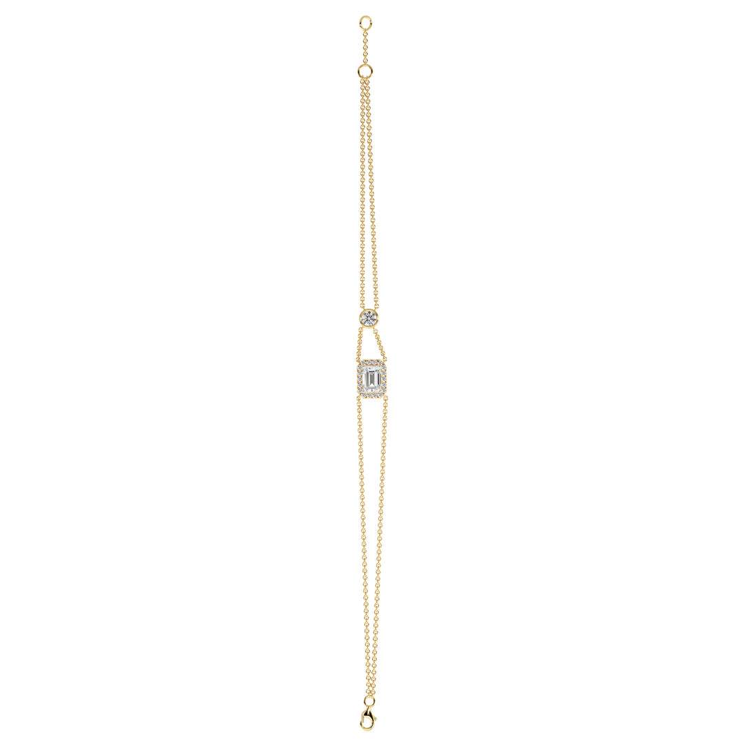 Elegant double-chain bracelet in 18K yellow gold, featuring a 1ct emerald-cut lab-grown diamond in a halo setting with 19 round EF/VS lab-grown diamonds
