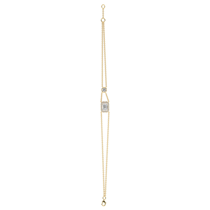 Elegant double-chain bracelet in 18K yellow gold, featuring a 1ct emerald-cut lab-grown diamond in a halo setting with 19 round EF/VS lab-grown diamonds
