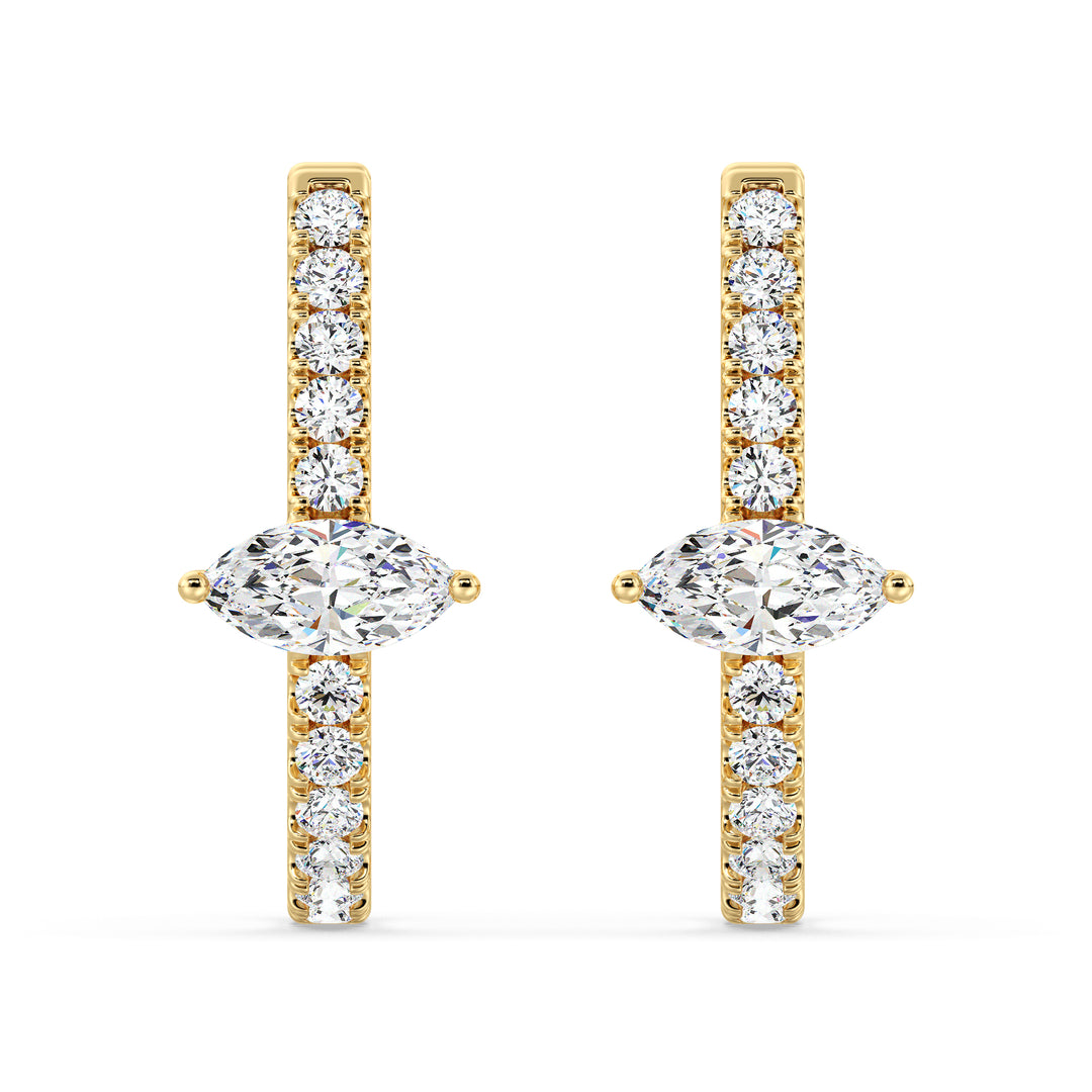 18K Yellow Gold Triple Hoop Huggie Earrings adorned with lab-grown pear and round-cut diamonds, featuring a radiant and intricate design