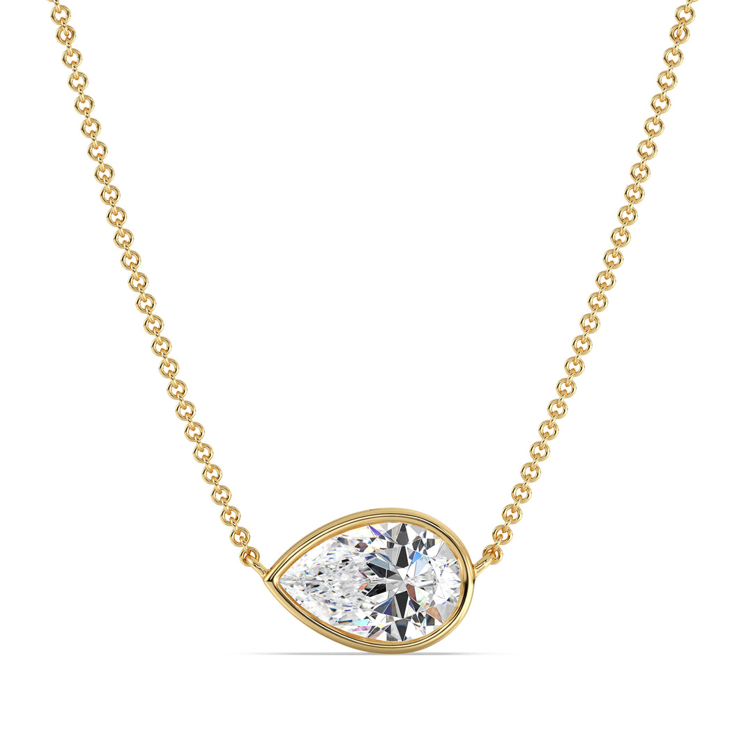 2 Carat Pear-Cut Lab-Grown Diamond Bezel-Set Solitaire Pendant Necklace in 18K Yellow Gold with a radiant teardrop-shaped diamond and sleek bezel setting