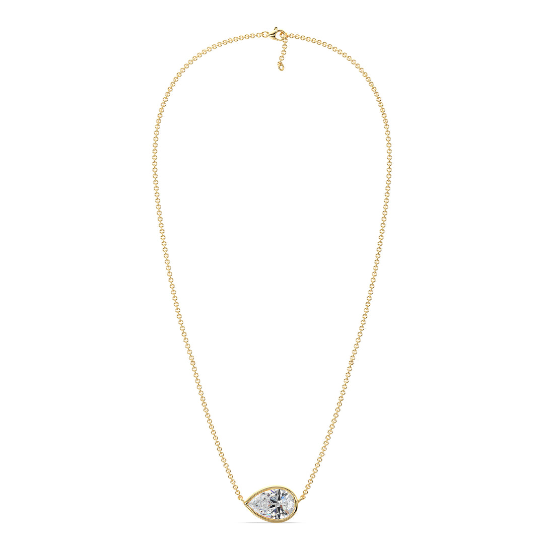 2 Carat Pear-Cut Lab-Grown Diamond Bezel-Set Solitaire Pendant Necklace in 18K Yellow Gold with a radiant teardrop-shaped diamond and sleek bezel setting