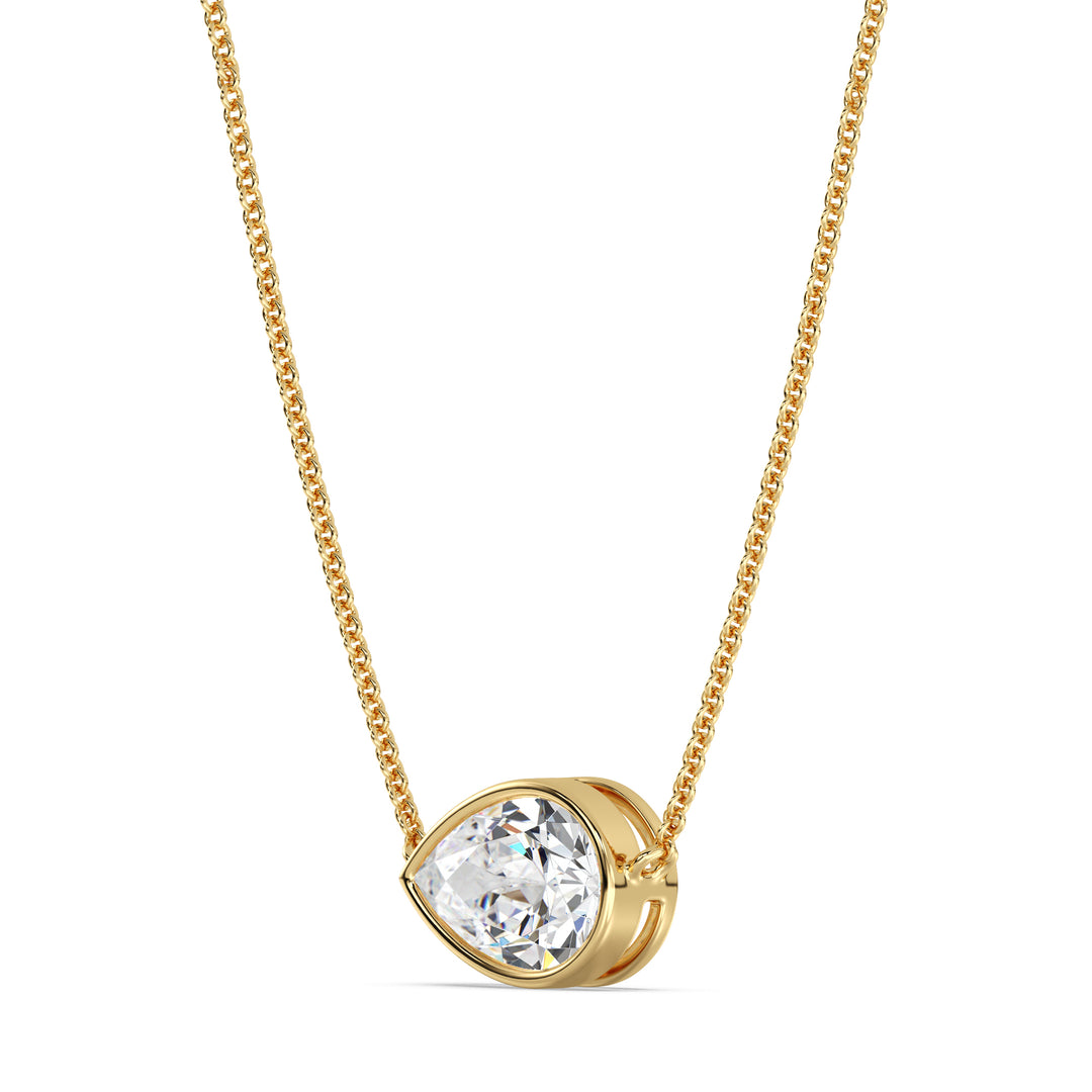 2 Carat Pear-Cut Lab-Grown Diamond Bezel-Set Solitaire Pendant Necklace in 18K Yellow Gold with a radiant teardrop-shaped diamond and sleek bezel setting