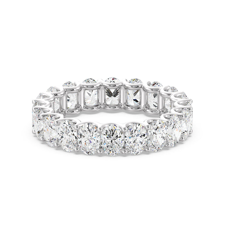 Timeless Oval Lab-Grown Diamond Scallop Eternity Band in 18K White Gold showcasing 20 brilliant oval-shaped diamonds in a shared prong setting with a scalloped side profile.