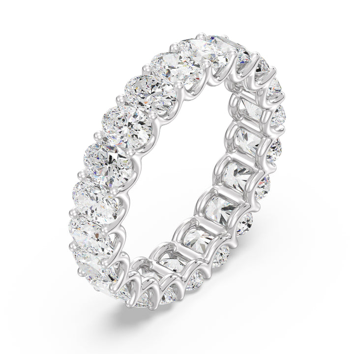 Timeless Oval Lab-Grown Diamond Scallop Eternity Band in 18K White Gold showcasing 20 brilliant oval-shaped diamonds in a shared prong setting with a scalloped side profile.