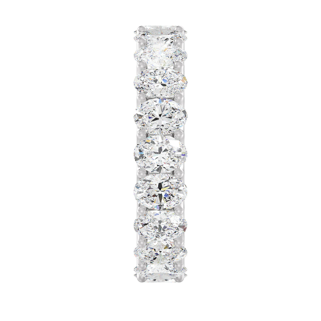 Timeless Oval Lab-Grown Diamond Scallop Eternity Band in 18K White Gold showcasing 20 brilliant oval-shaped diamonds in a shared prong setting with a scalloped side profile.