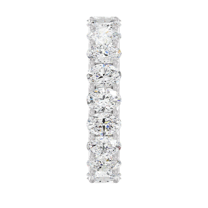 Timeless Oval Lab-Grown Diamond Scallop Eternity Band in 18K White Gold showcasing 20 brilliant oval-shaped diamonds in a shared prong setting with a scalloped side profile.