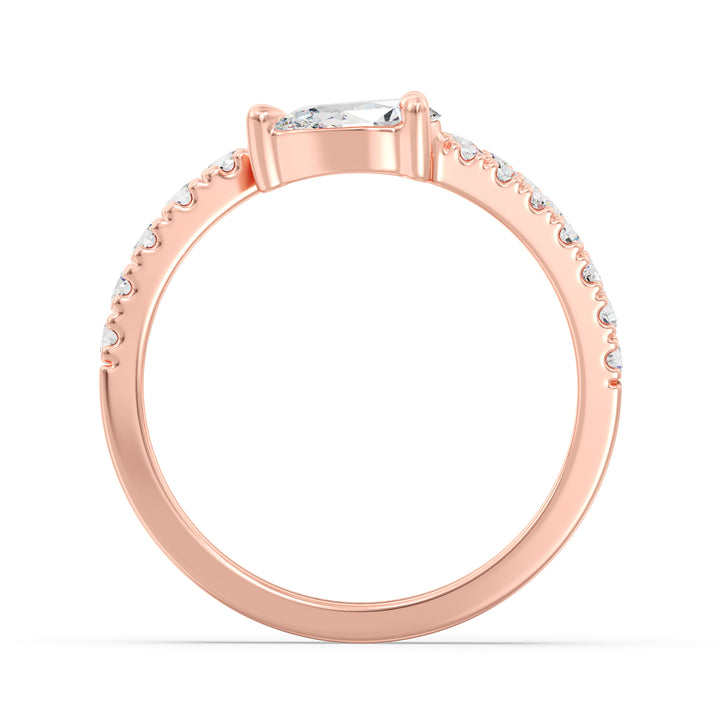 Stylish pear-shaped lab-grown diamond adjustable open cuff ring in 18K rose gold featuring a 0.50-carat pear-shaped diamond and round-cut diamond accents