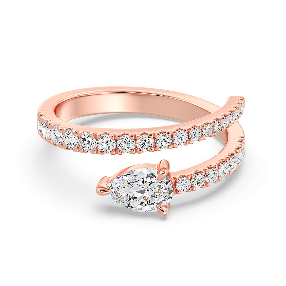 Stylish pear-shaped lab-grown diamond adjustable open cuff ring in 18K rose gold featuring a 0.50-carat pear-shaped diamond and round-cut diamond accents