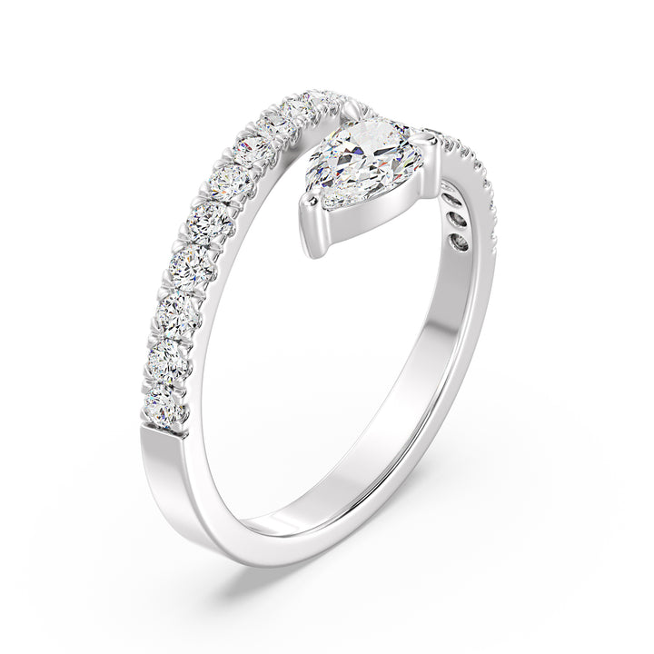 Modern pear-shaped lab-grown diamond adjustable open cuff ring in 18K white gold with a 0.50-carat pear-shaped diamond and sparkling round-cut diamond accents