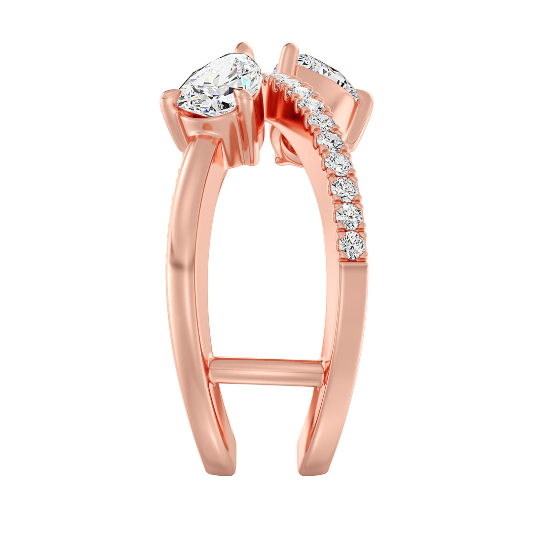 Elegant Pear-Shaped Lab-Grown Diamond Dual-Stone Twisted Ring in 18K Rose Gold, showcasing two 0.50-carat pear-cut diamonds and 21 sparkling round-cut side stones.