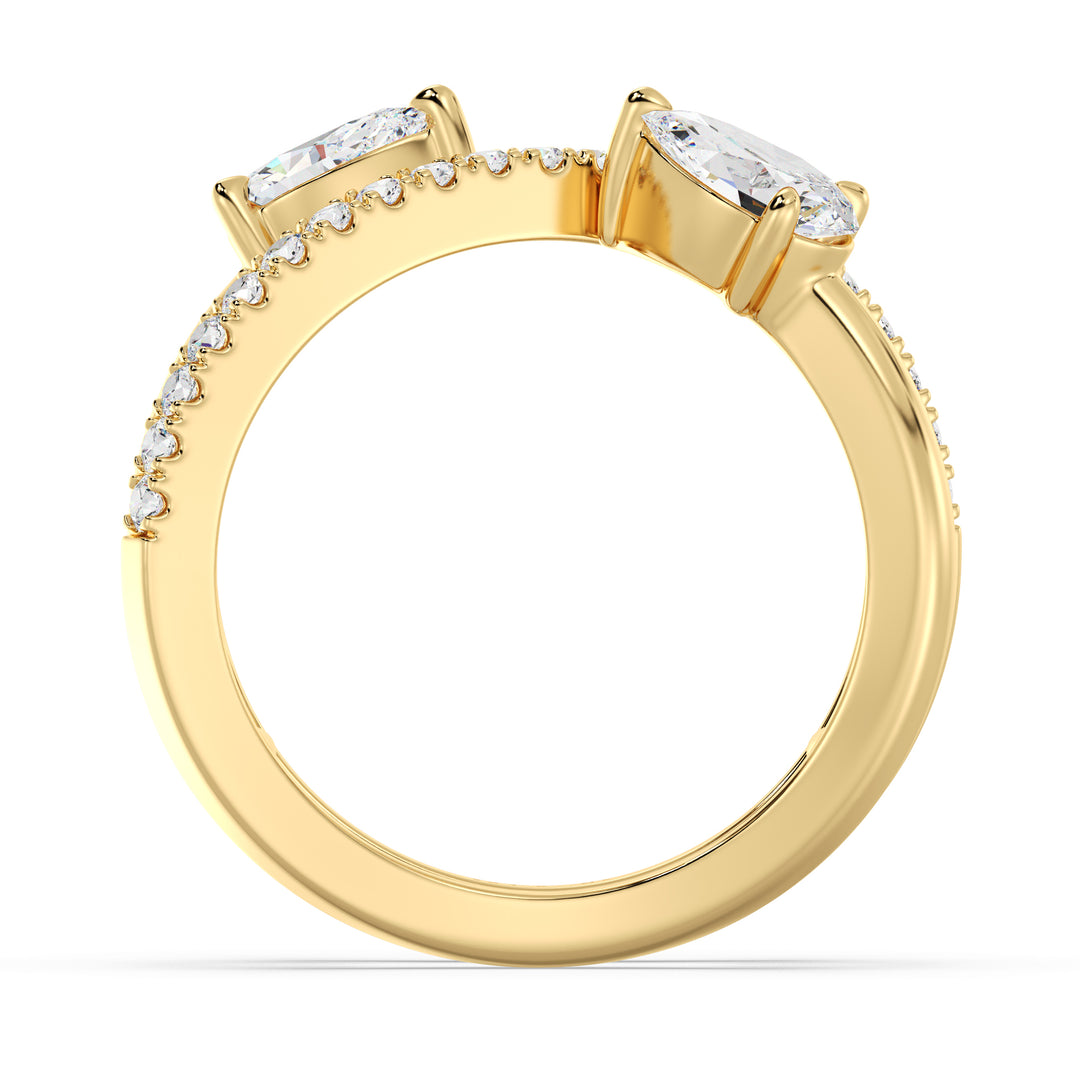 Elegant Pear-Shaped Lab-Grown Diamond Dual-Stone Twisted Ring in 18K Yellow Gold, featuring two 0.50-carat pear-cut diamonds and 21 round-cut side stones