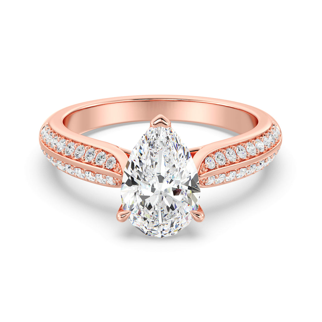 Elegant pear-cut lab-grown diamond engagement ring with pavé band in 18K rose gold, showcasing a dazzling pear-cut center stone and sparkling round lab-grown diamonds
