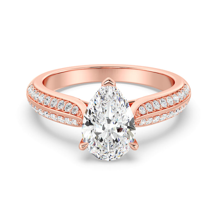 Elegant pear-cut lab-grown diamond engagement ring with pavé band in 18K rose gold, showcasing a dazzling pear-cut center stone and sparkling round lab-grown diamonds