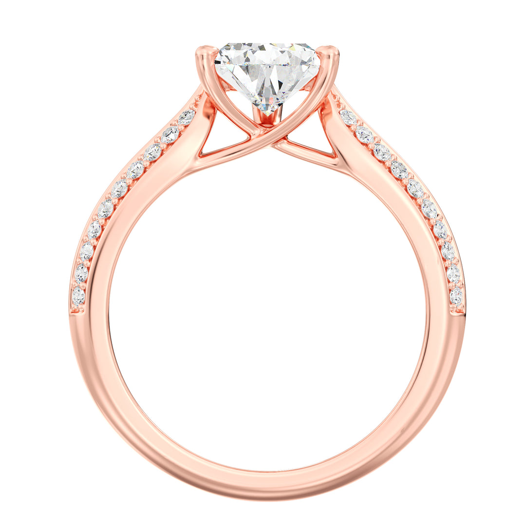Elegant pear-cut lab-grown diamond engagement ring with pavé band in 18K rose gold, showcasing a dazzling pear-cut center stone and sparkling round lab-grown diamonds