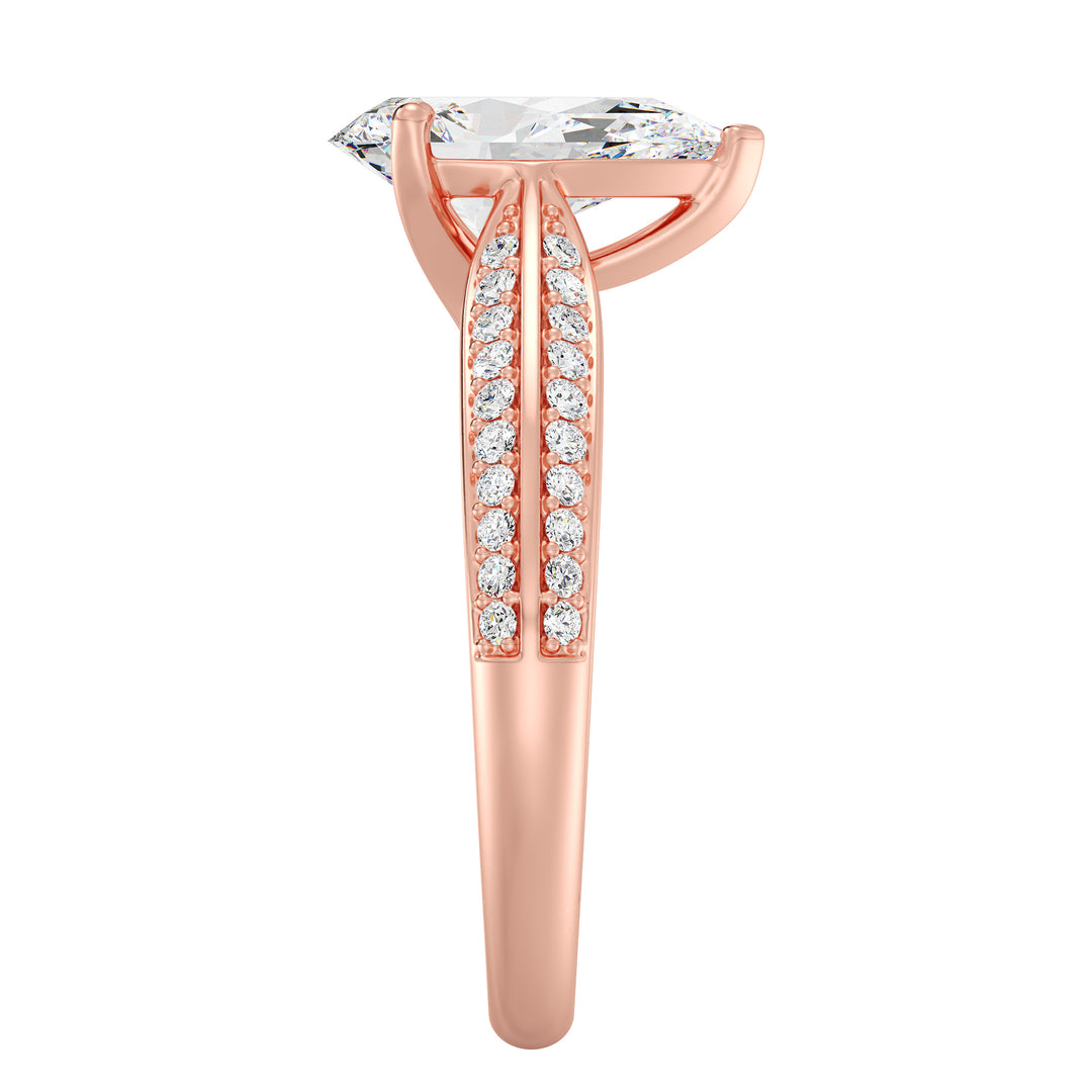 Elegant pear-cut lab-grown diamond engagement ring with pavé band in 18K rose gold, showcasing a dazzling pear-cut center stone and sparkling round lab-grown diamonds
