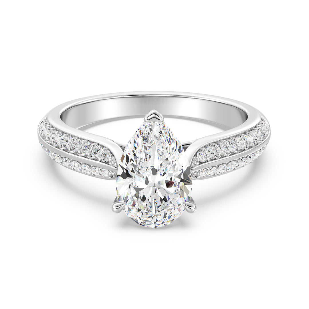 Elegant pear-cut lab-grown diamond engagement ring with pavé band in 18K white gold, highlighted by a stunning pear-cut center stone and shimmering round lab-grown diamonds.