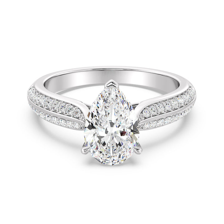 Elegant pear-cut lab-grown diamond engagement ring with pavé band in 18K white gold, highlighted by a stunning pear-cut center stone and shimmering round lab-grown diamonds.