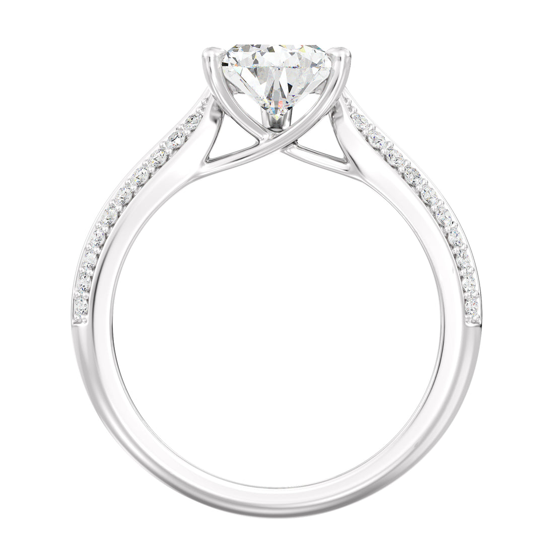 Elegant pear-cut lab-grown diamond engagement ring with pavé band in 18K white gold, highlighted by a stunning pear-cut center stone and shimmering round lab-grown diamonds.