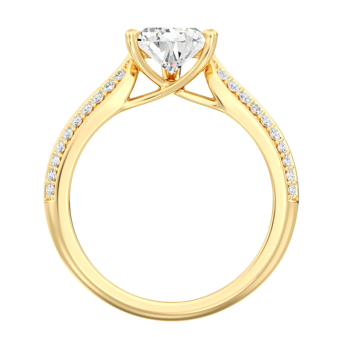 Elegant pear-cut lab-grown diamond engagement ring with pavé band in 18K yellow gold, featuring a brilliant pear-cut center stone and round lab-grown diamonds.