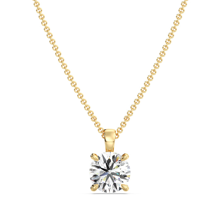 Round-Cut Lab-Grown Diamond Solitaire Pendant in 18K Yellow Gold with a classic 4-prong setting, showcasing a brilliant lab-grown diamond. Chain not included