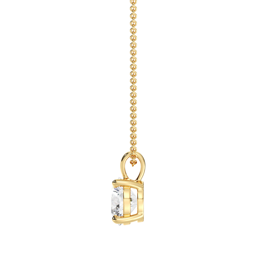 Round-Cut Lab-Grown Diamond Solitaire Pendant in 18K Yellow Gold with a classic 4-prong setting, showcasing a brilliant lab-grown diamond. Chain not included
