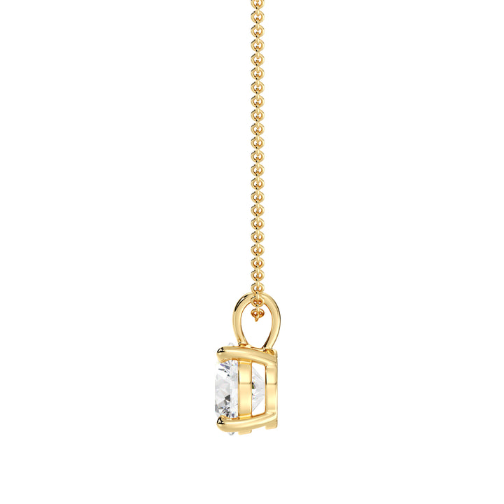 Round-Cut Lab-Grown Diamond Solitaire Pendant in 18K Yellow Gold with a classic 4-prong setting, showcasing a brilliant lab-grown diamond. Chain not included
