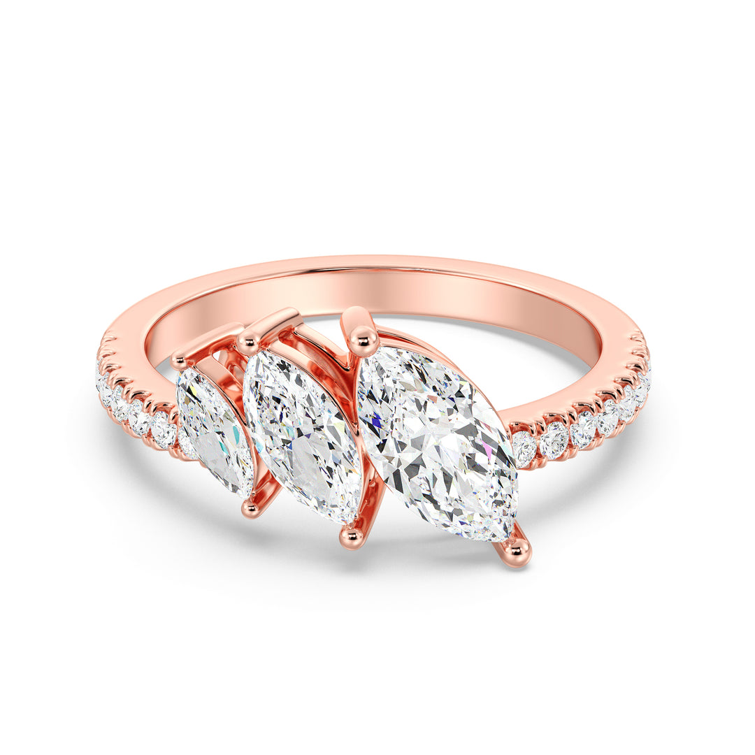 Sophisticated Three-Stone Marquise-Cut Lab-Grown Diamond Wedding Ring in 18K Rose Gold, adorned with marquise-cut diamonds and pavé diamond accents