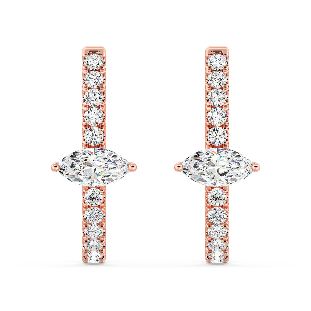18K Rose Gold Triple Hoop Huggie Earrings embellished with shimmering lab-grown pear and round-cut diamonds, showcasing a warm and elegant design