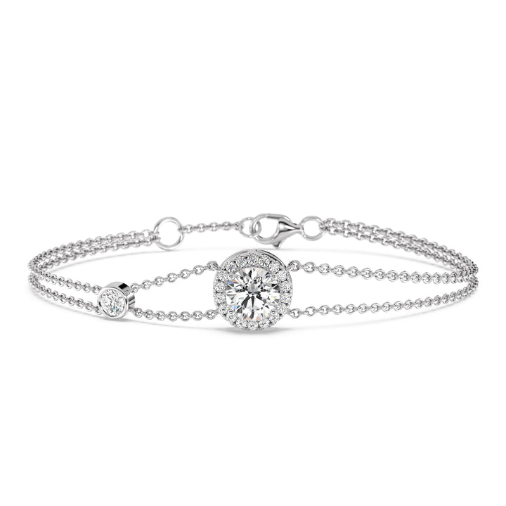 Image of the Halo-Set Round Lab-Grown Diamond Double Chain Bracelet in 18K White Gold, highlighting a 1ct round-cut lab-grown diamond framed by a halo of 19 smaller diamonds, paired with an elegant double-chain design.