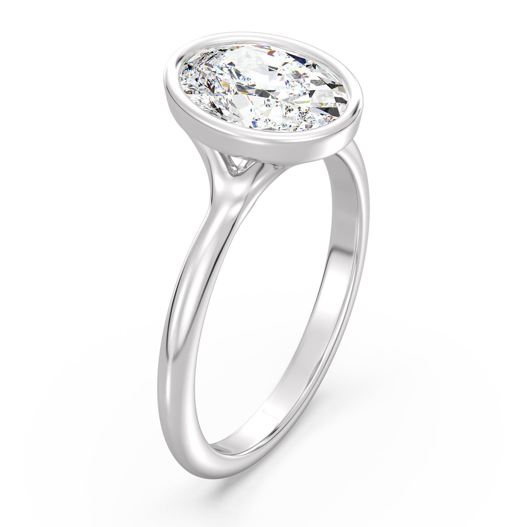 Oval-Cut Lab-Grown Diamond Solitaire Ring in 18K White Gold with Bezel Setting, Available in 1ct, 2ct, 3ct, or 4ct.