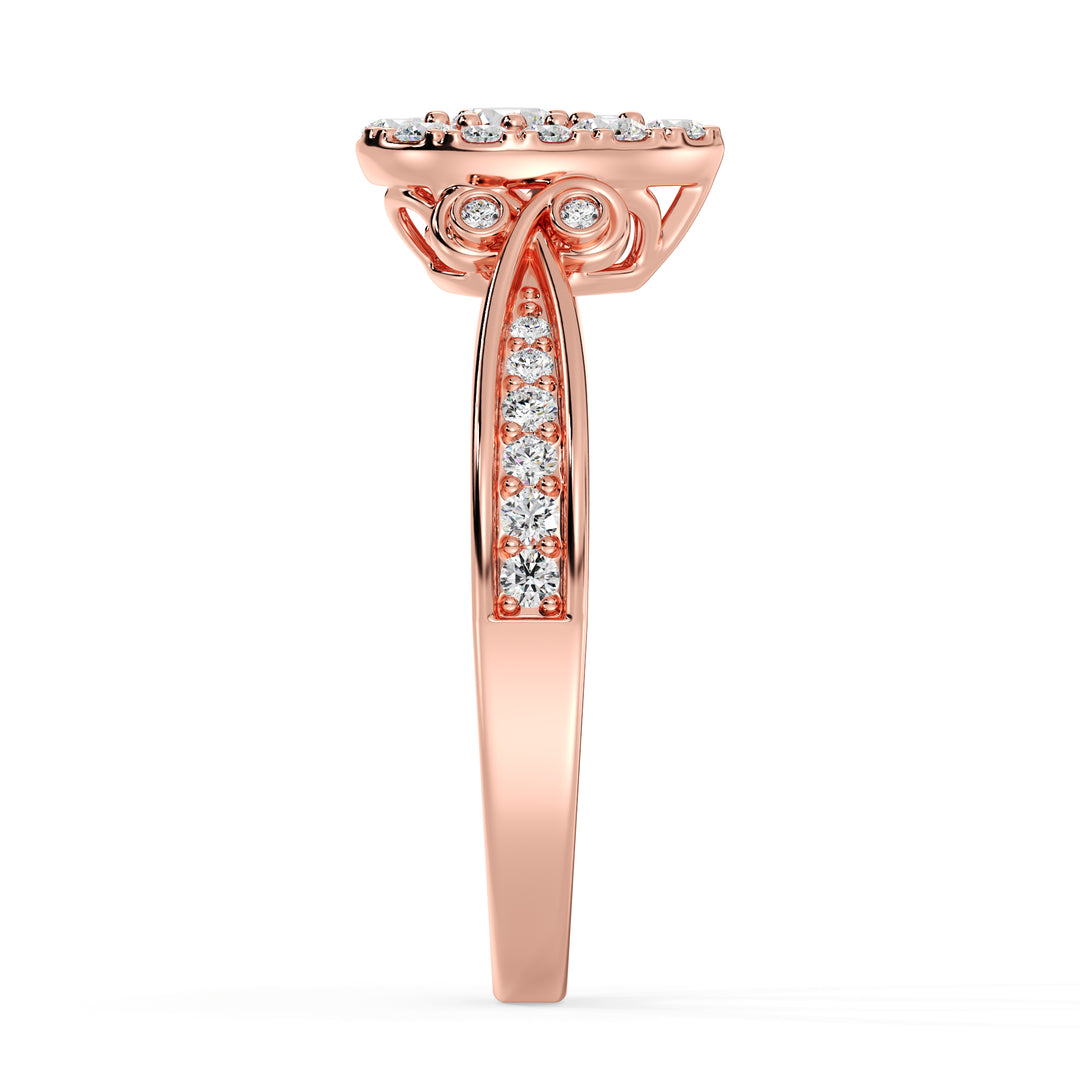 18K rose gold pear-shaped cluster halo engagement ring adorned with 0.70 CTTW round EF-VS lab-grown diamonds, highlighting a romantic and sophisticated design