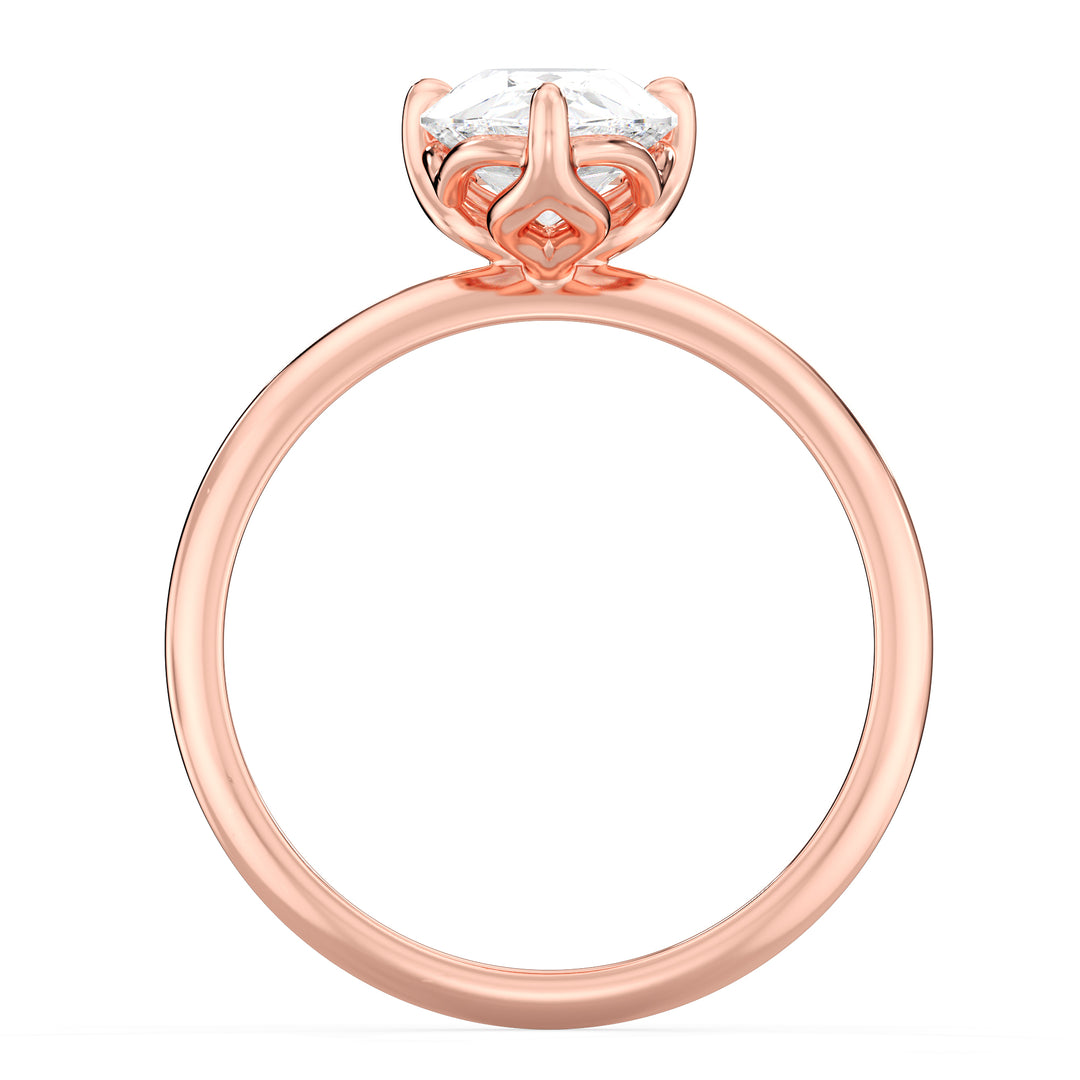 Elegant Pear-Cut Lab Diamond Solitaire Engagement Ring in 18K Rose Gold, showcasing a stunning EF color VS clarity lab-grown diamond in an open basket setting.