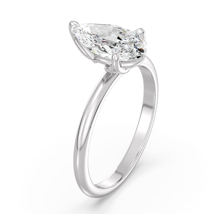 Timeless Pear-Cut Lab Diamond Solitaire Engagement Ring in 18K White Gold, highlighting an EF color VS clarity lab-grown diamond in a sleek claw-prong setting