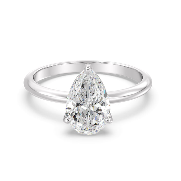 Timeless Pear-Cut Lab Diamond Solitaire Engagement Ring in 18K White Gold, highlighting an EF color VS clarity lab-grown diamond in a sleek claw-prong setting