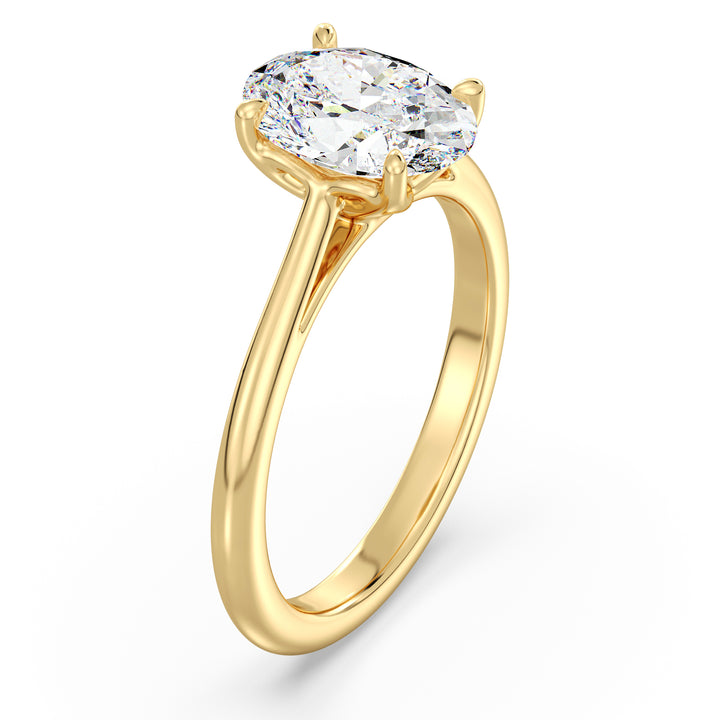 Timeless Oval-Cut Lab-Grown Diamond Solitaire Engagement Ring in 18K Yellow Gold with Classic 4-Claw Setting, showcasing a radiant oval-cut diamond with exceptional brilliance