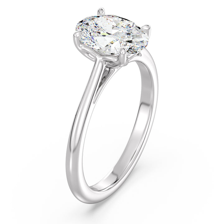 Sophisticated Oval-Cut Lab-Grown Diamond Solitaire Engagement Ring in 18K White Gold with Classic 4-Claw Setting, highlighting sleek elegance and a dazzling oval-cut diamond