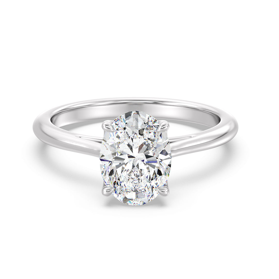 Sophisticated Oval-Cut Lab-Grown Diamond Solitaire Engagement Ring in 18K White Gold with Classic 4-Claw Setting, highlighting sleek elegance and a dazzling oval-cut diamond
