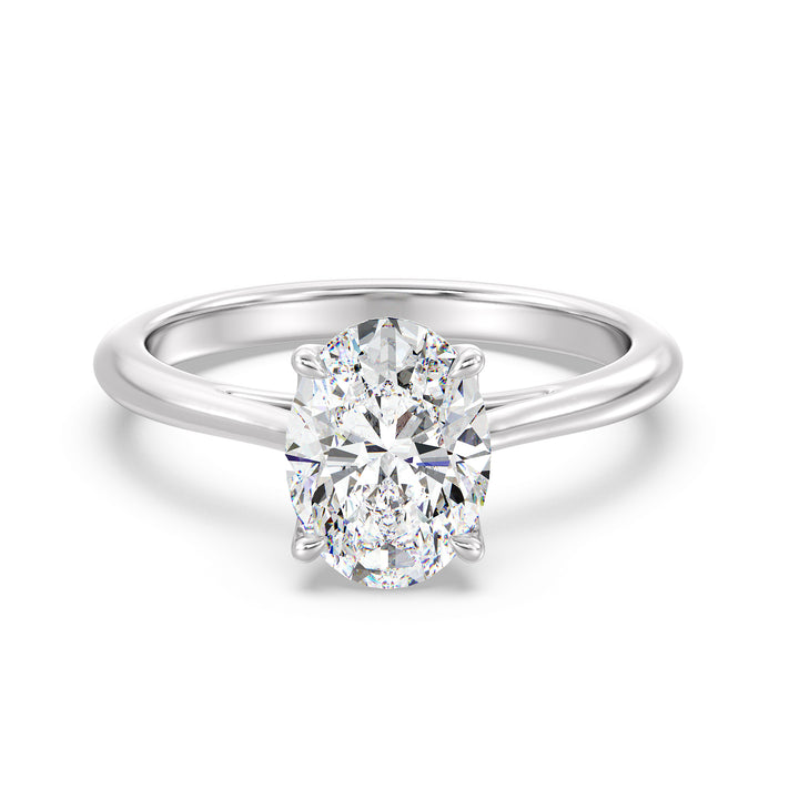 Sophisticated Oval-Cut Lab-Grown Diamond Solitaire Engagement Ring in 18K White Gold with Classic 4-Claw Setting, highlighting sleek elegance and a dazzling oval-cut diamond