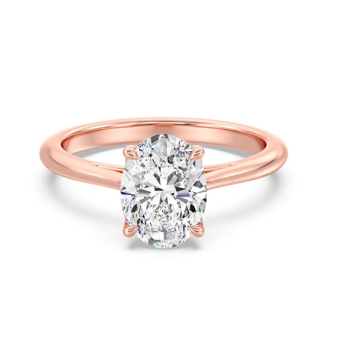 Elegant Oval-Cut Lab-Grown Diamond Solitaire Engagement Ring in 18K Rose Gold with Classic 4-Claw Setting, featuring a romantic blush-tone metal and a sparkling oval diamond.