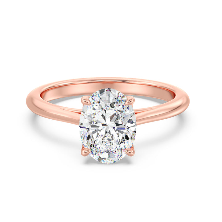 Elegant Oval-Cut Lab-Grown Diamond Solitaire Engagement Ring in 18K Rose Gold with Classic 4-Claw Setting, featuring a romantic blush-tone metal and a sparkling oval diamond.